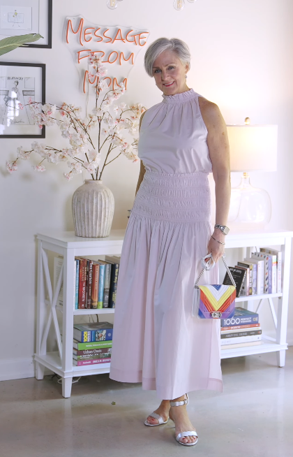 Elegant pleated midi skirt styled in Beth’s summer wardrobe over 50.